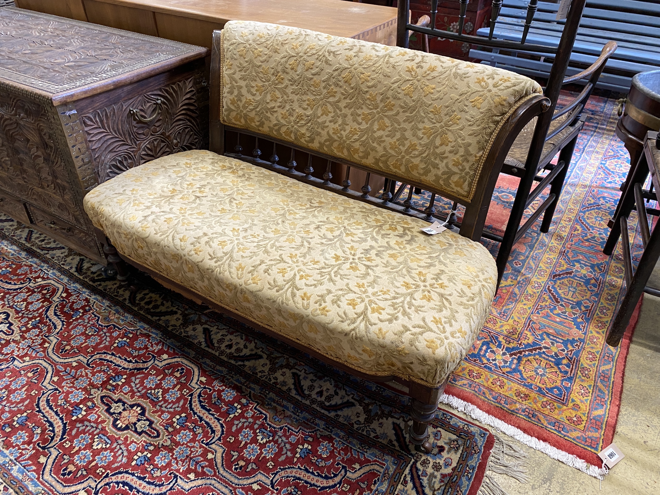 A late Victorian mahogany salon settee, length 104cm, depth 51cm, height 69cm